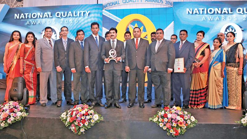 CEO, ABM Ceylon Limited, M. Ramachandran and his team with the award.